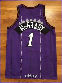 1998-99 Raptors Tracy McGrady Game Used Worn Jersey 50 + 4 pro cut issued rookie